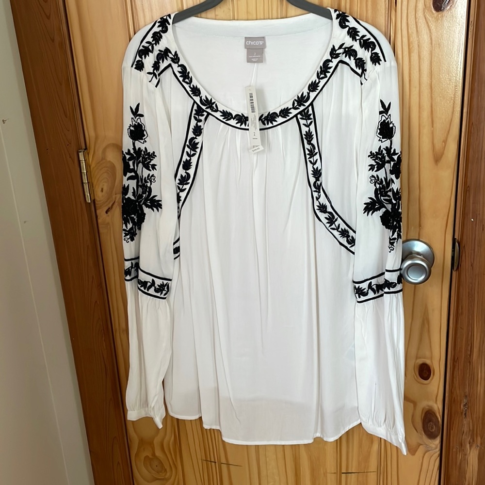 Chico’s white and black embellished blouse. Size 2